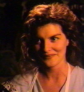 Elena (Rene Russo) smiles back at Grishka