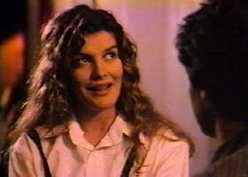 Elena (Rene Russo) asks Grishka for help with Alex.