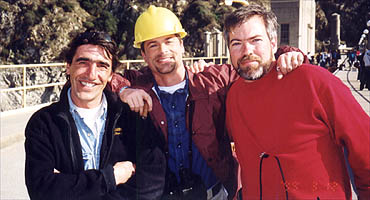 Director, Star and DP pose on top of the dam.